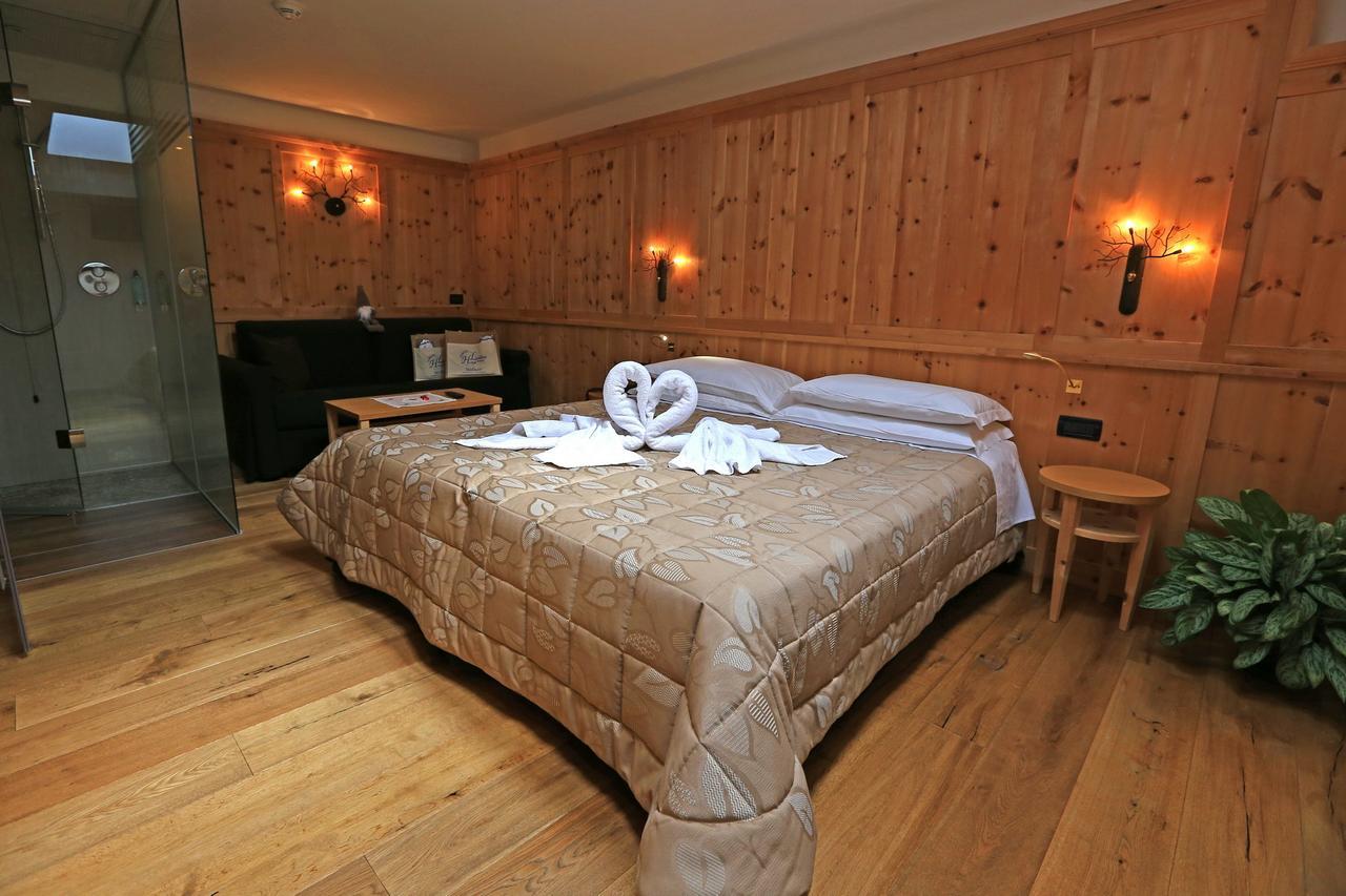 Hotel Ladina Campitello di Fassa Bagian luar foto